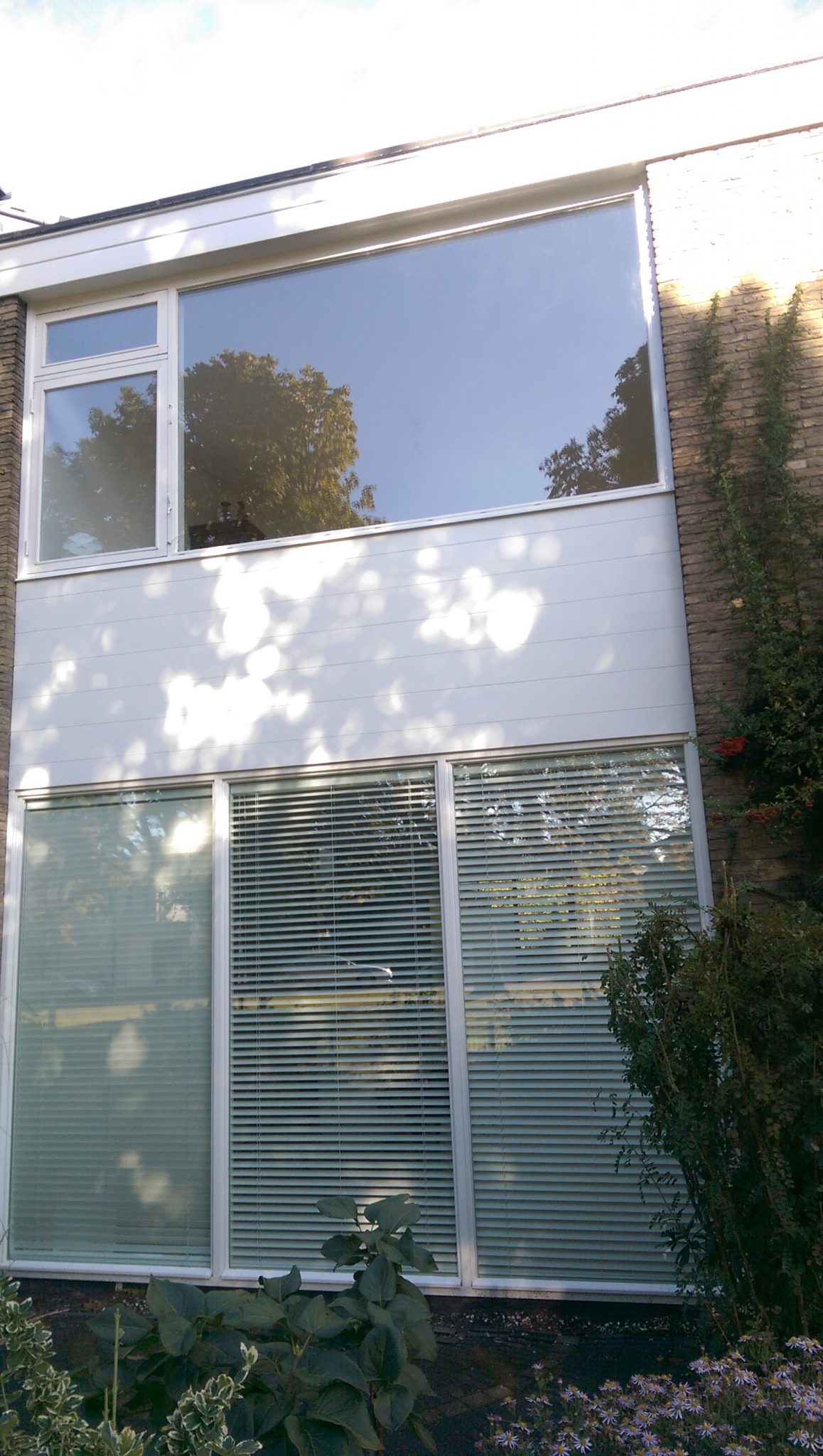 Gevelbekleding, renovatie en boeidelen herstellen